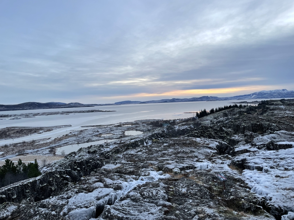 Frozen landscape with a large body of water
