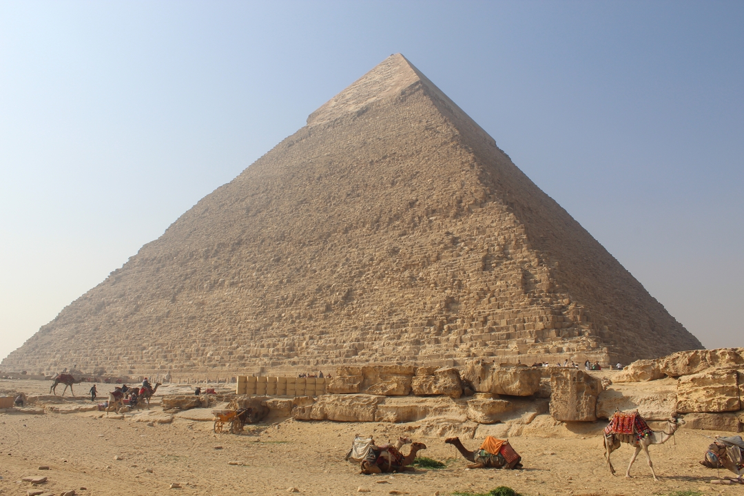 The Great Pyramid of Giza against a clear sky.