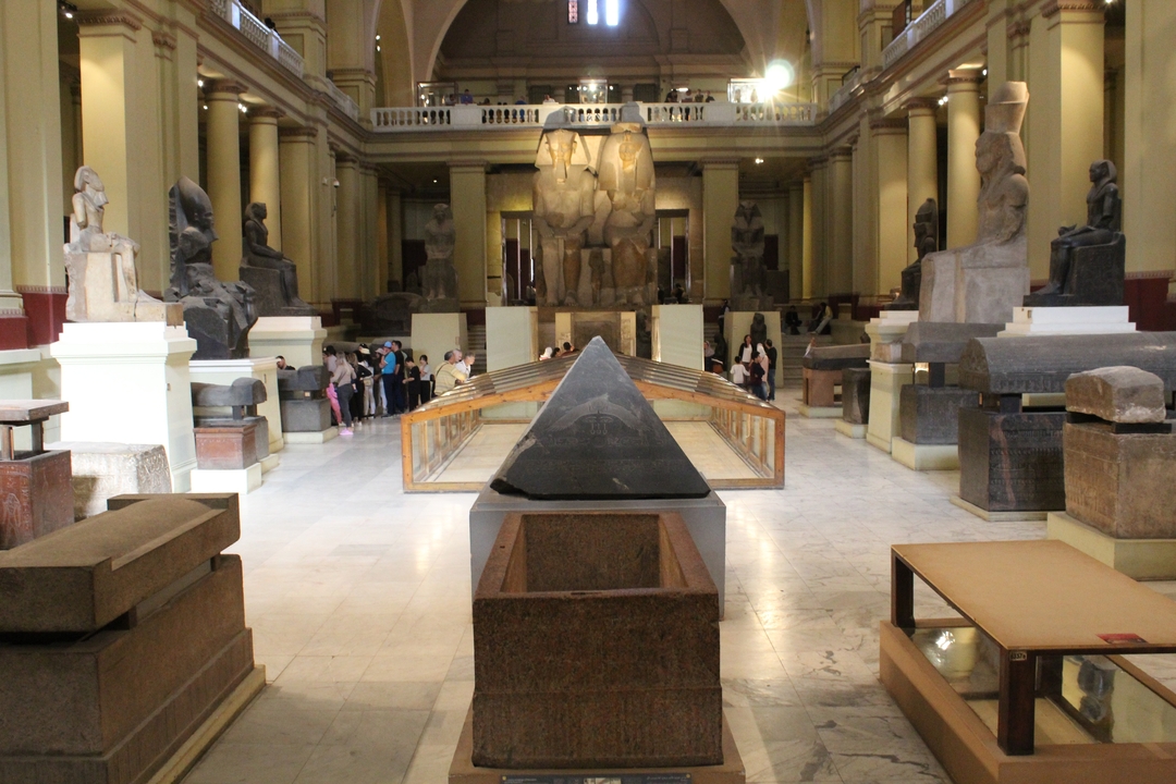 Museum interior with ancient Egyptian artifacts.