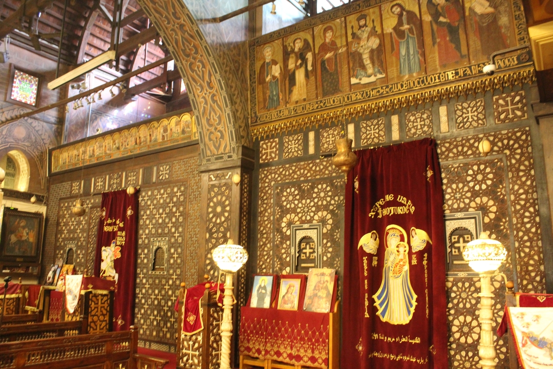 Interior of a richly decorated religious building in Egypt.