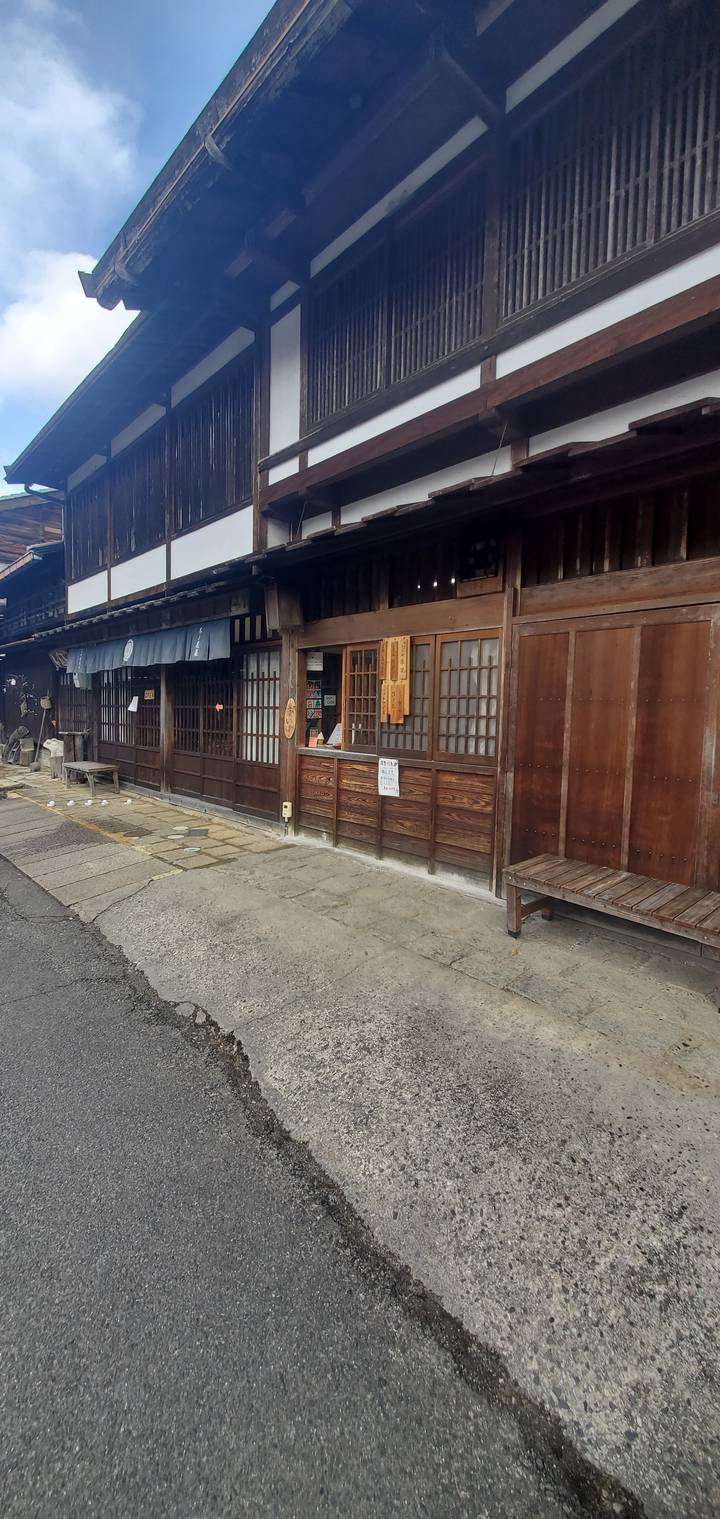 Traditional wooden buildings in a historic Japanese town.