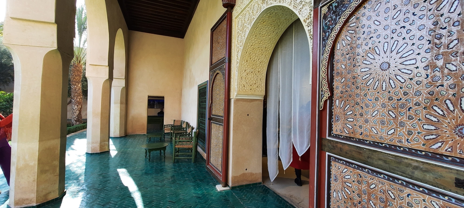 Traditional Moroccan architecture with tiles and arches.