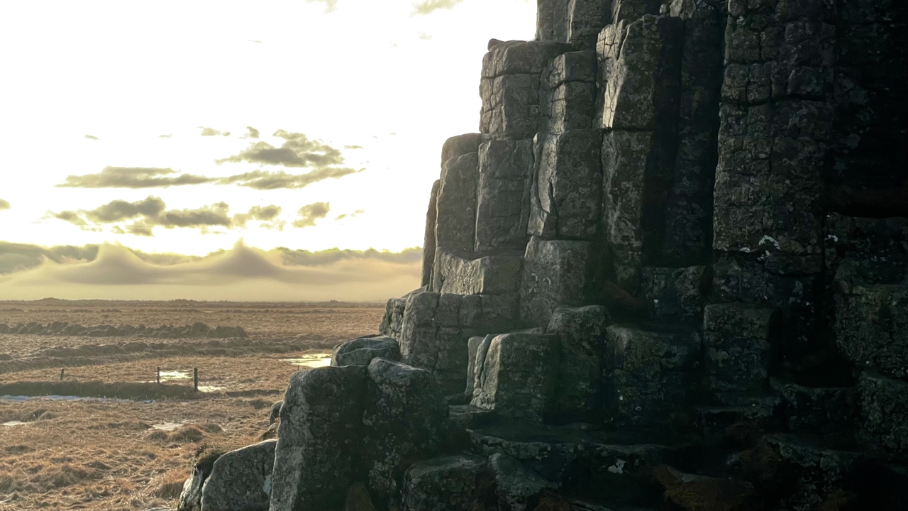 Rock formations against a backdrop of an overcast sky.