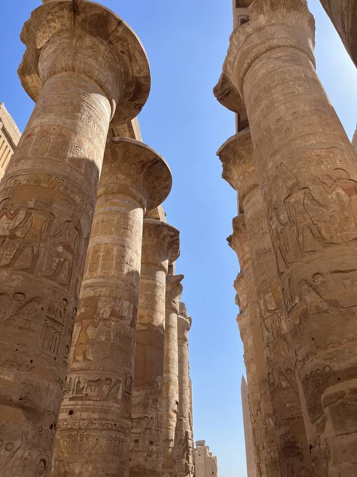 Large stone columns with hieroglyphics.