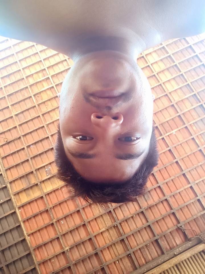 Close-up of a person under a roof.