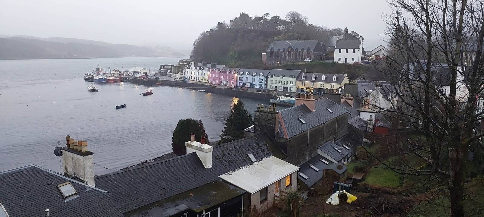 Seaside village with colorful houses along the waterfront.