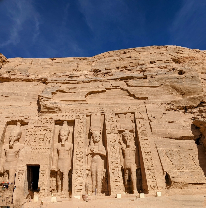 Ancient rock carvings with hieroglyphics.