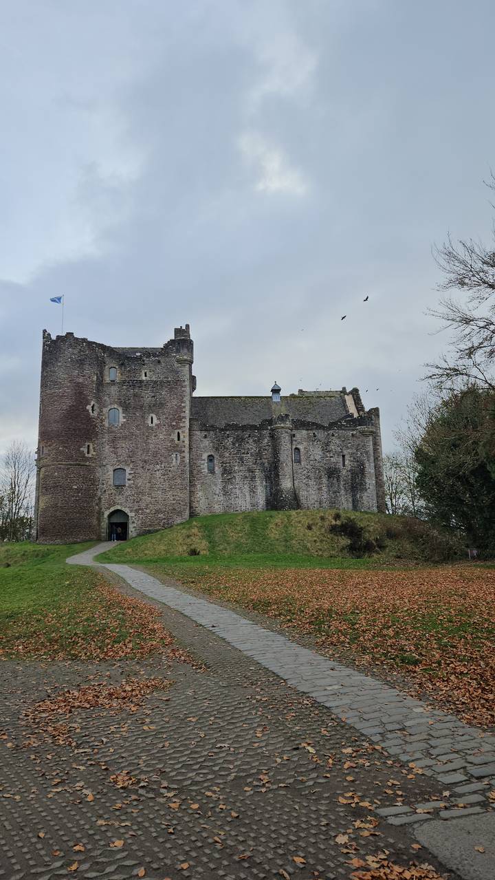 Stone statue in a carved alcove.