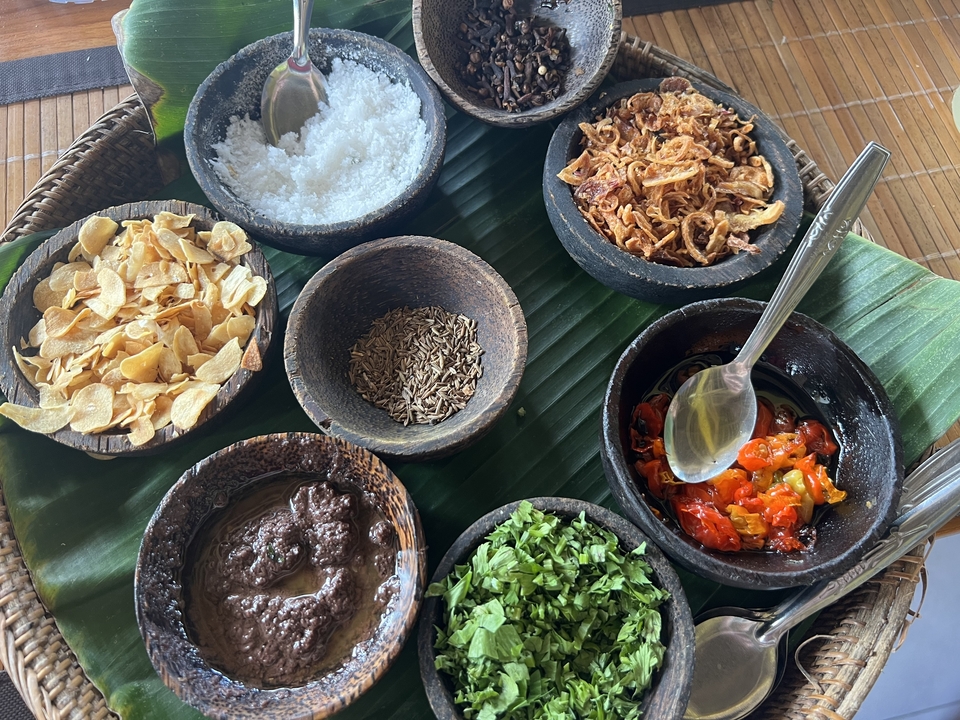 A variety of traditional food condiments in bowls.