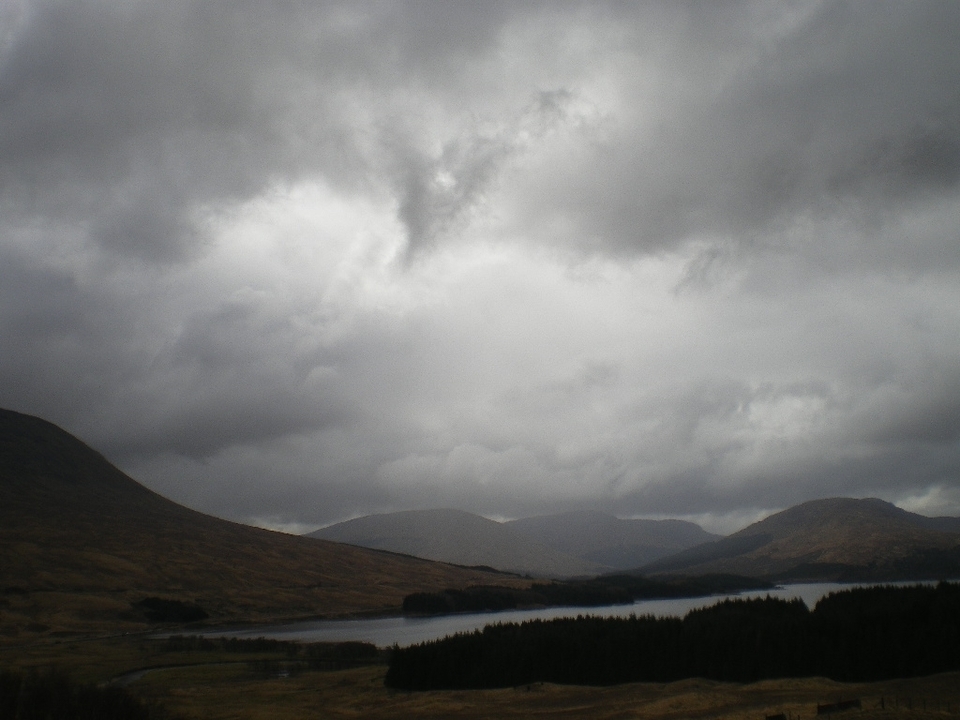 Cloudy mountainous landscape view.