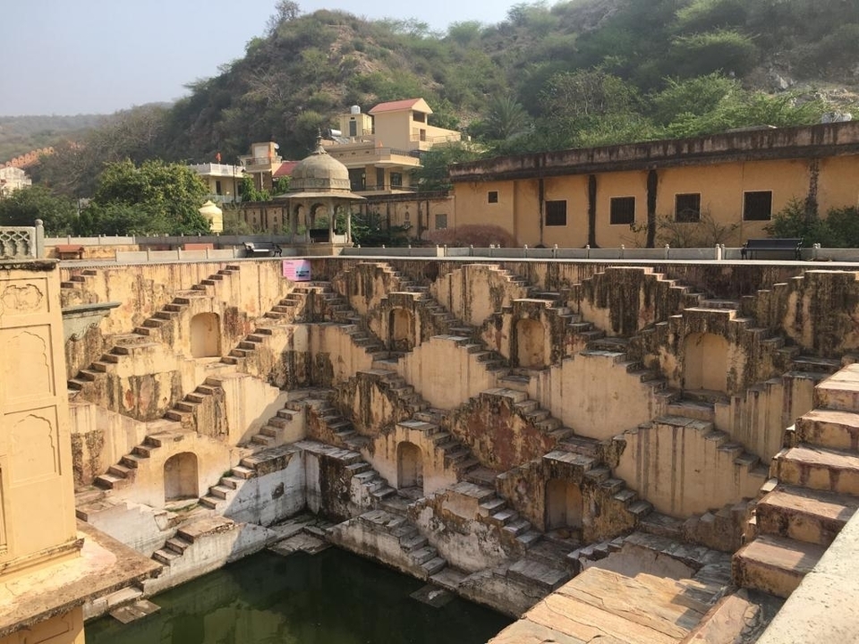 Ancient stepwell with architectural details.