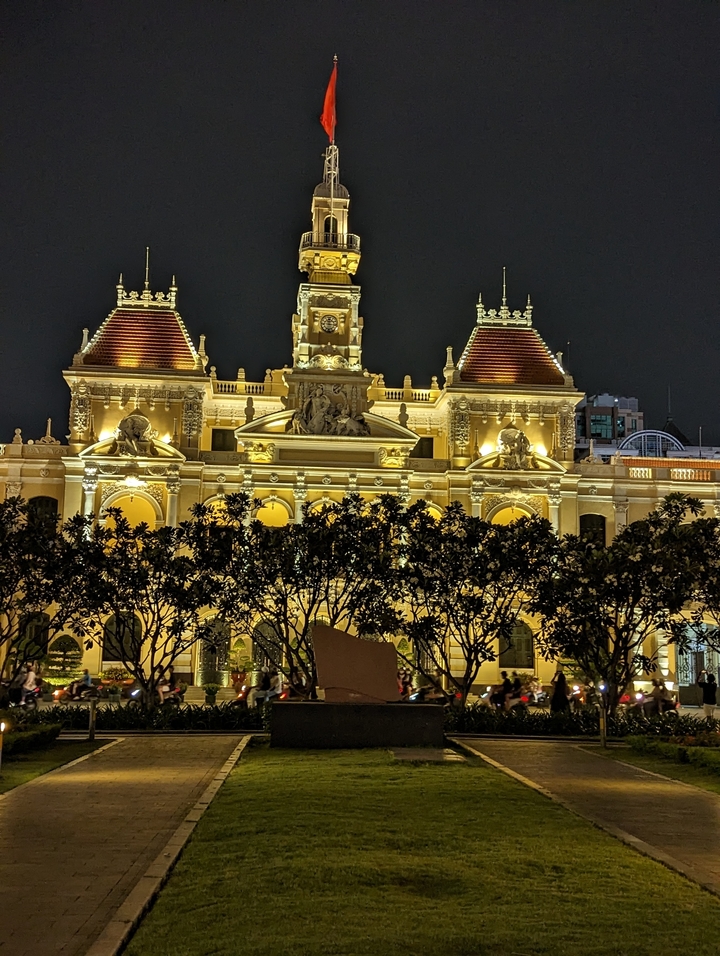Illuminated historic building at night.