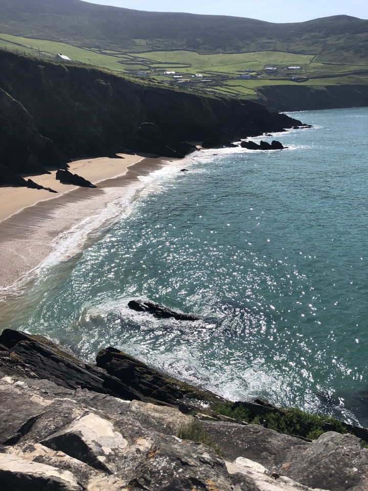 Sandy beach with clear blue waters