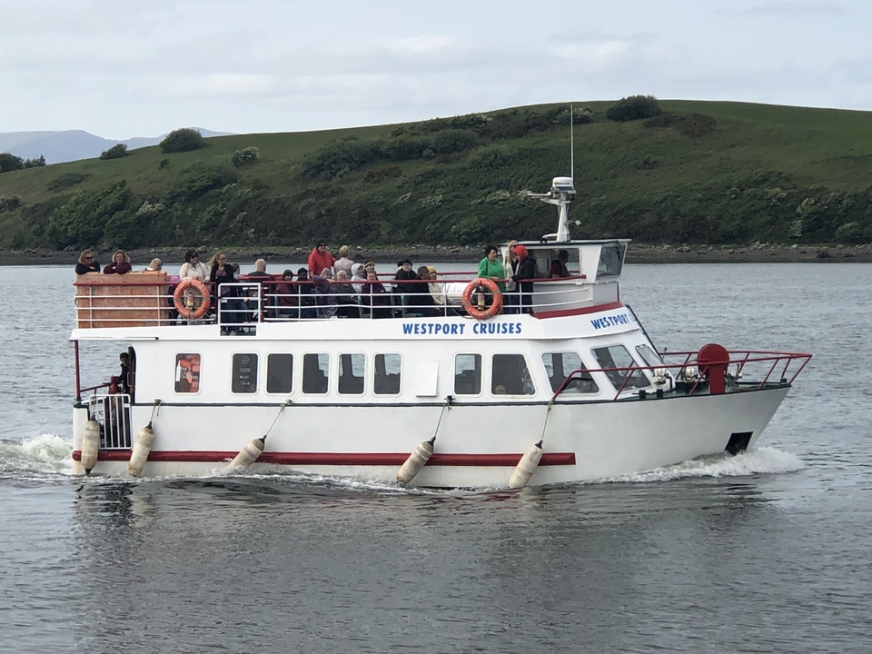 Boat with people on a river cruise