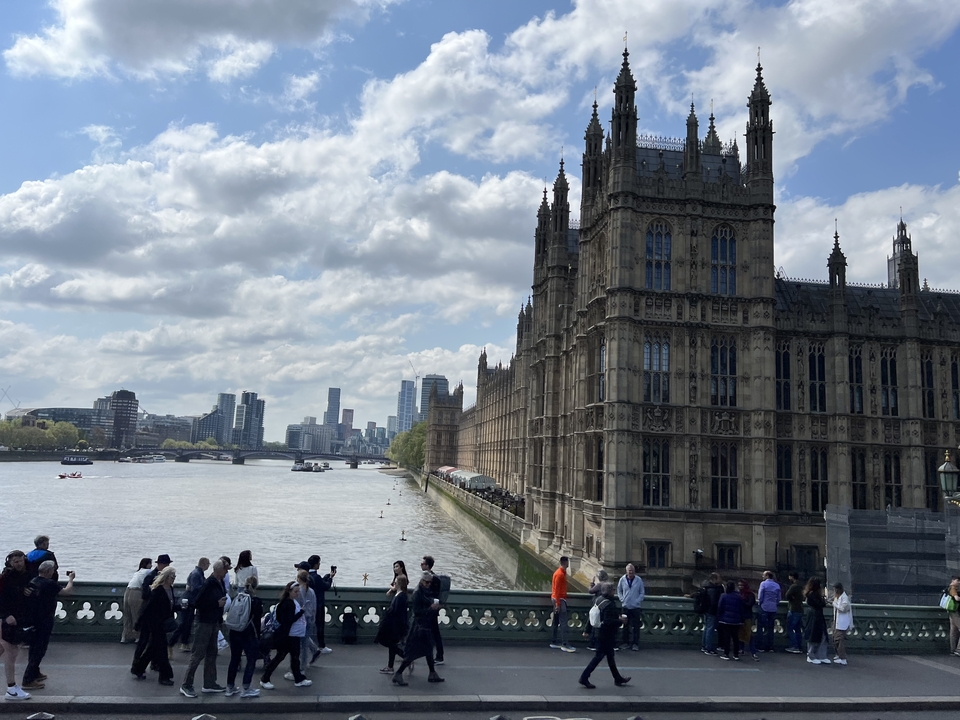 View of the River Thames with Houses of Parliament.