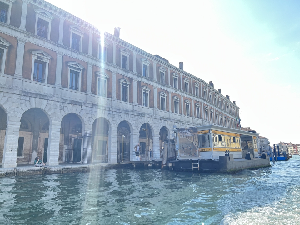 Venetian building with water below.