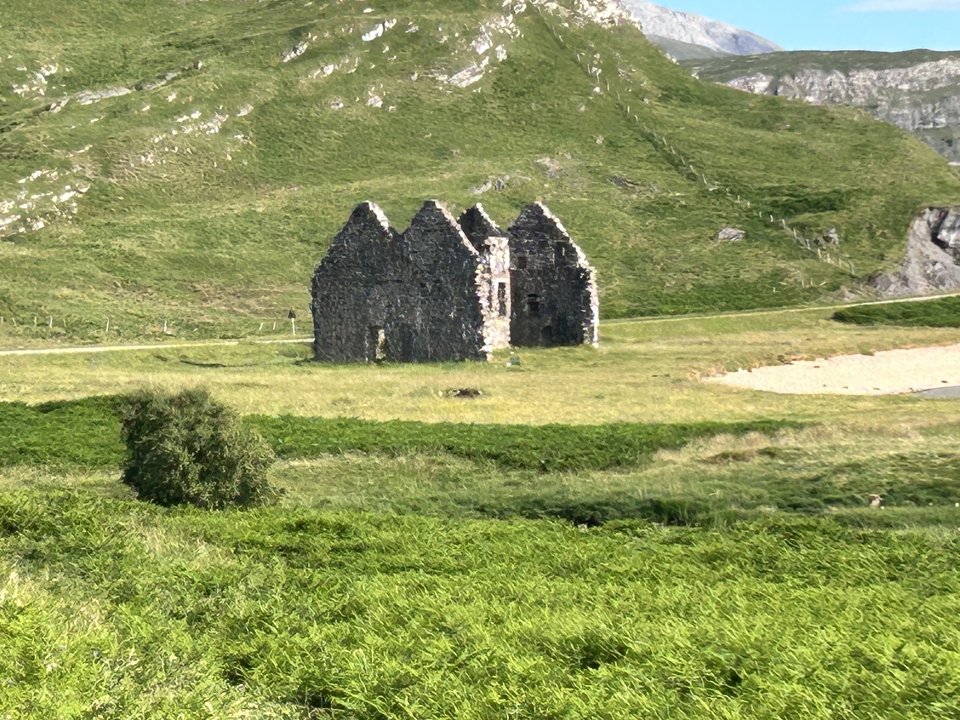 Ruined structure in grassy hills