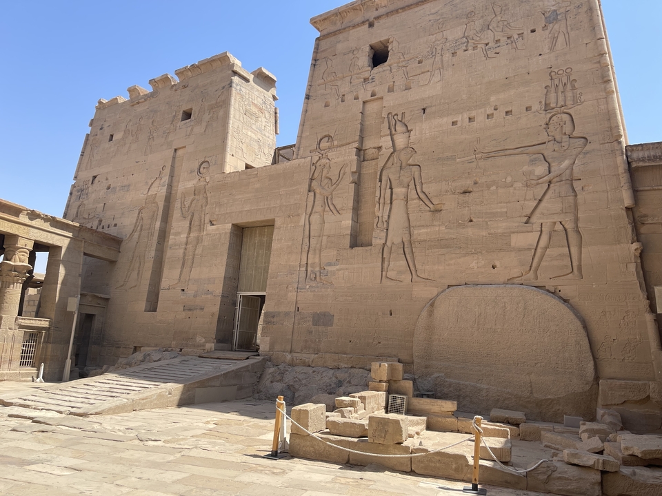Ancient temple ruins with large carvings.