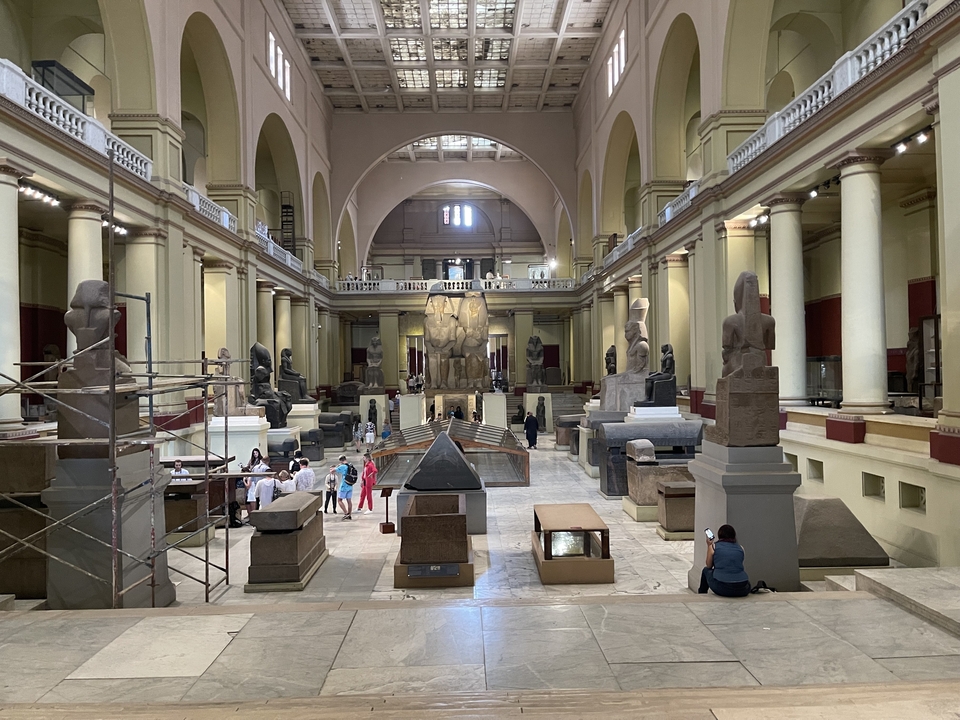 Interior of the Egyptian Museum with ancient artifacts.
