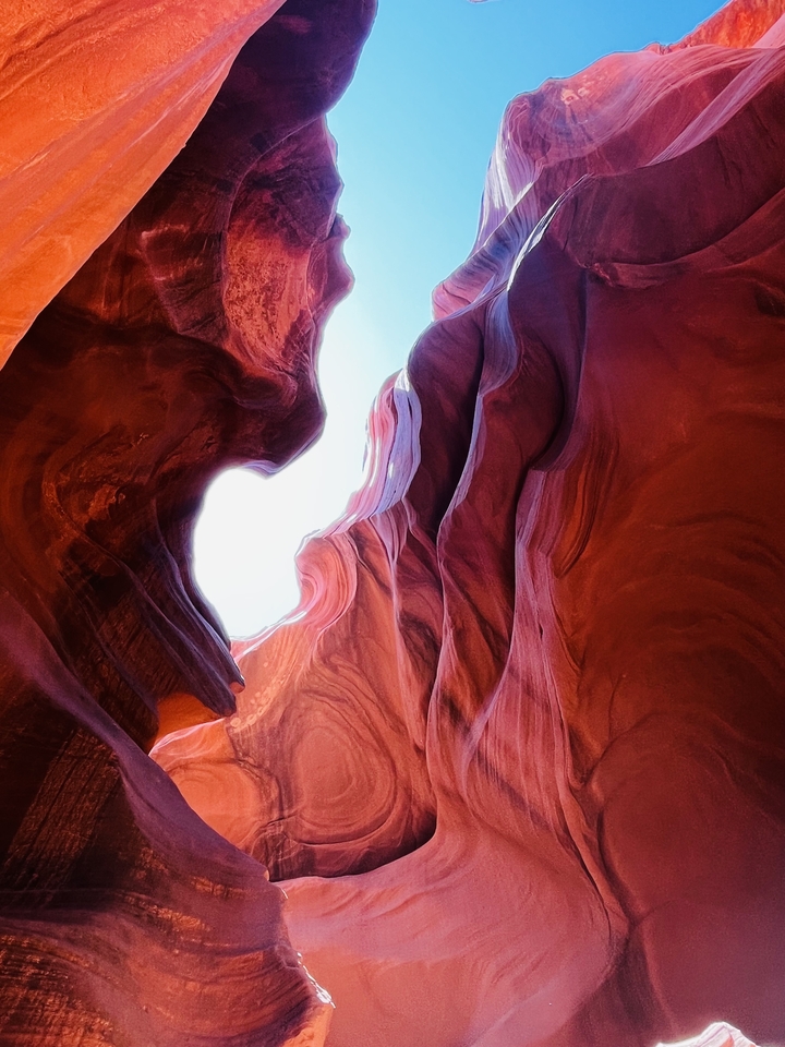 Dramatic rock formations with sunlight streaming in.