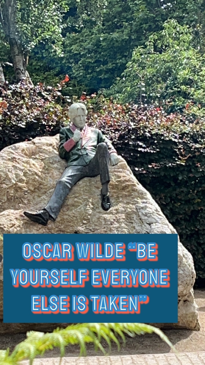 Statue with overlay text.