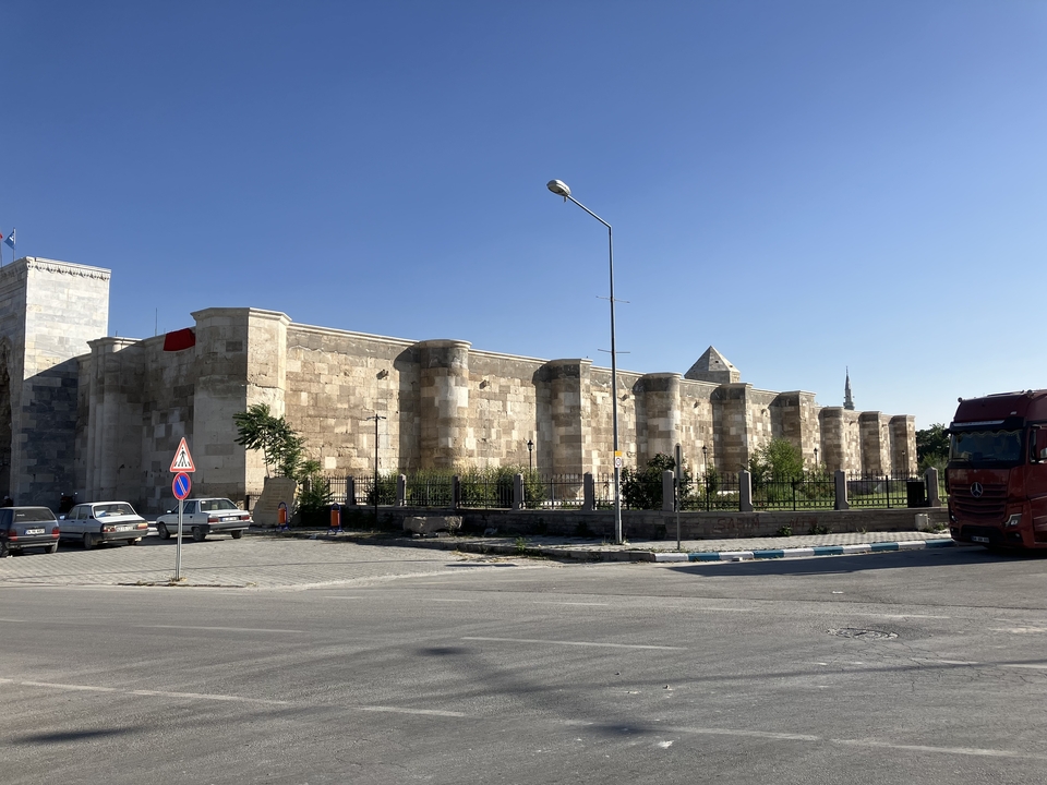 Historic stone fortress wall in a clear day.