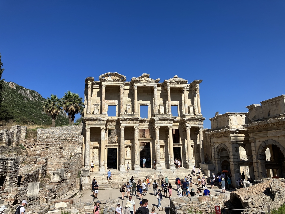The ancient Celsus Library with visitors in front.
