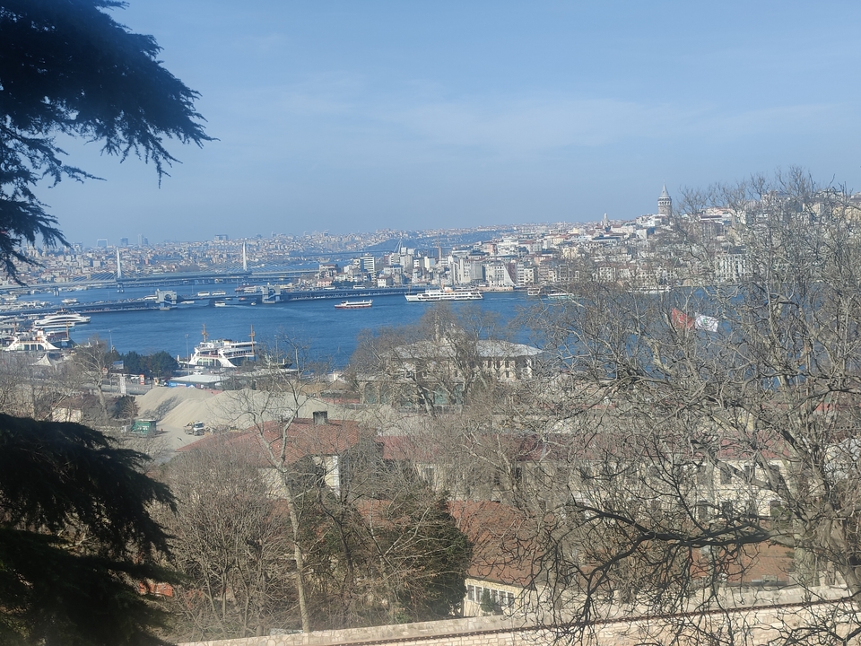 Cityscape view with waterway and boats in Istanbul.