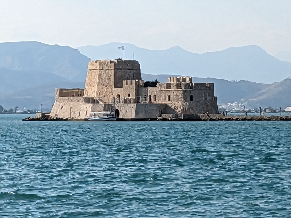 Castle-like structure in the middle of water.