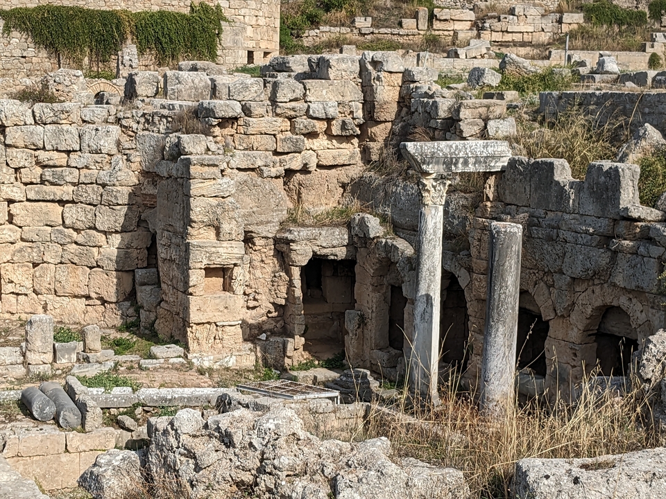 Ancient ruins with stone columns.