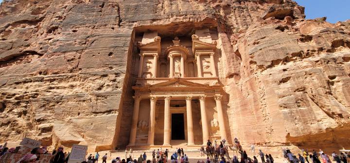 The Treasury of Petra carved into the rock face in Jordan.