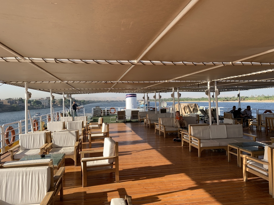 Empty deck of a cruise ship on a river.