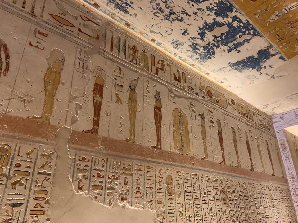 Wall art and hieroglyphs in an ancient Egyptian site.