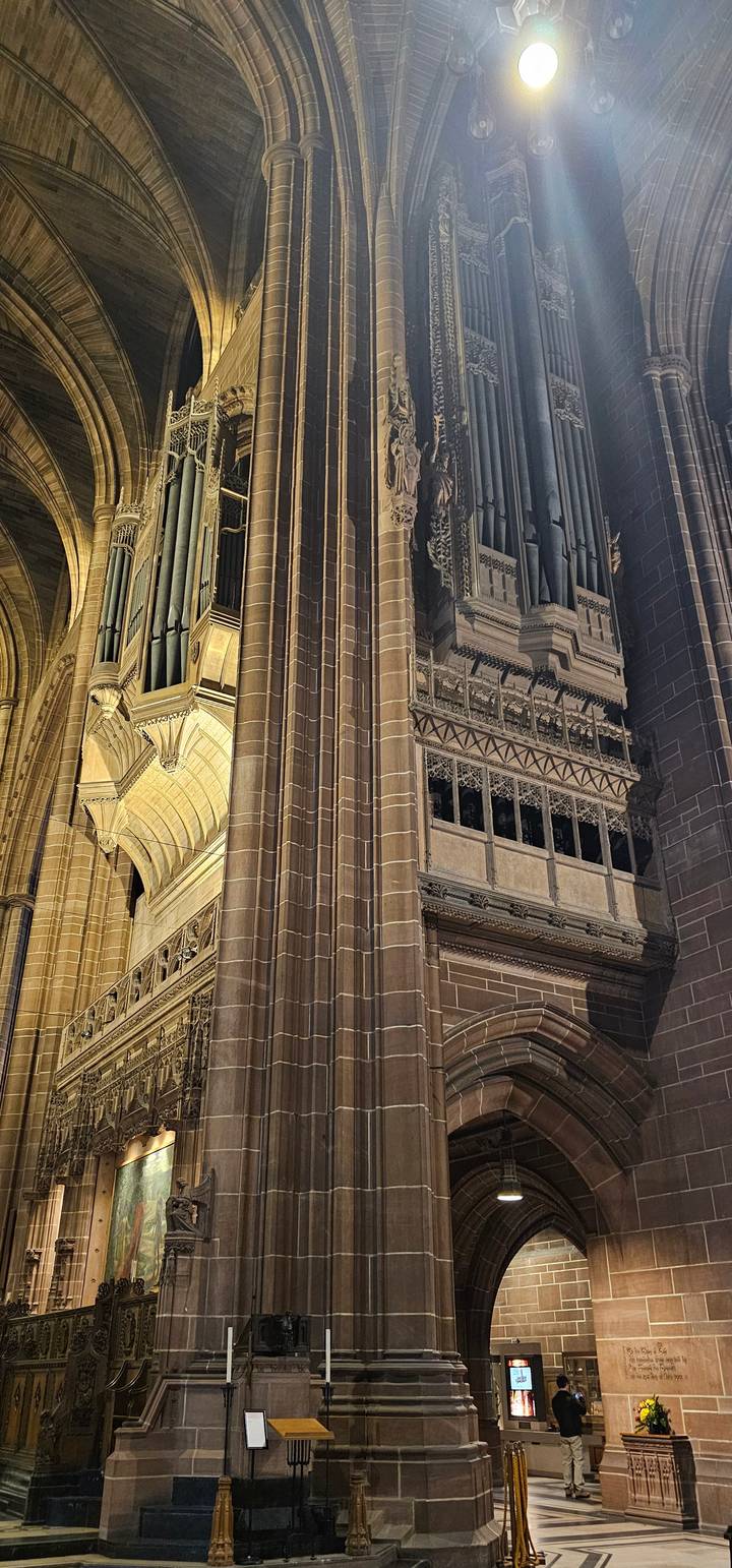 Interior of a cathedral with ornate architectural details.