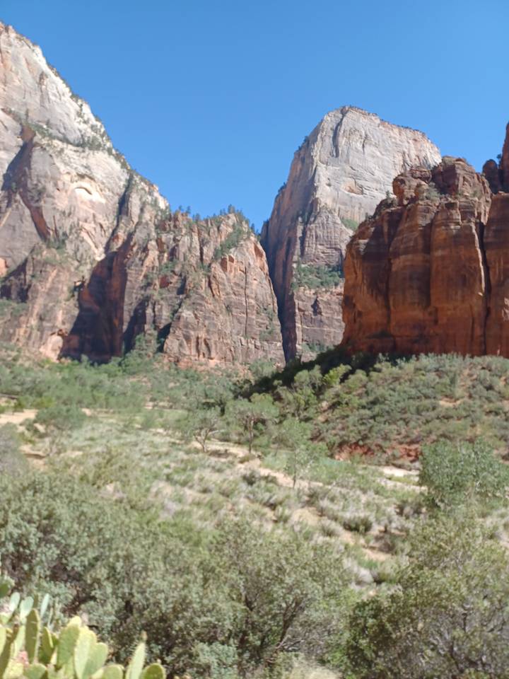 Rocky landscape with blue sky.