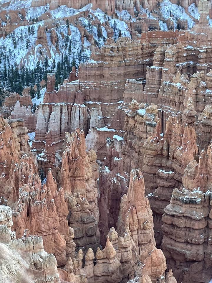 Close-up of rock formations with a mix of red and tan colors.