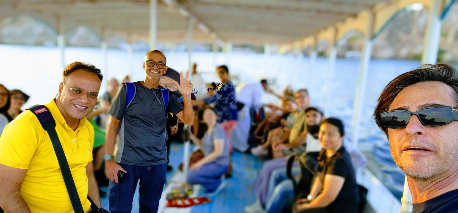 Group of people on a boat ride on a river.