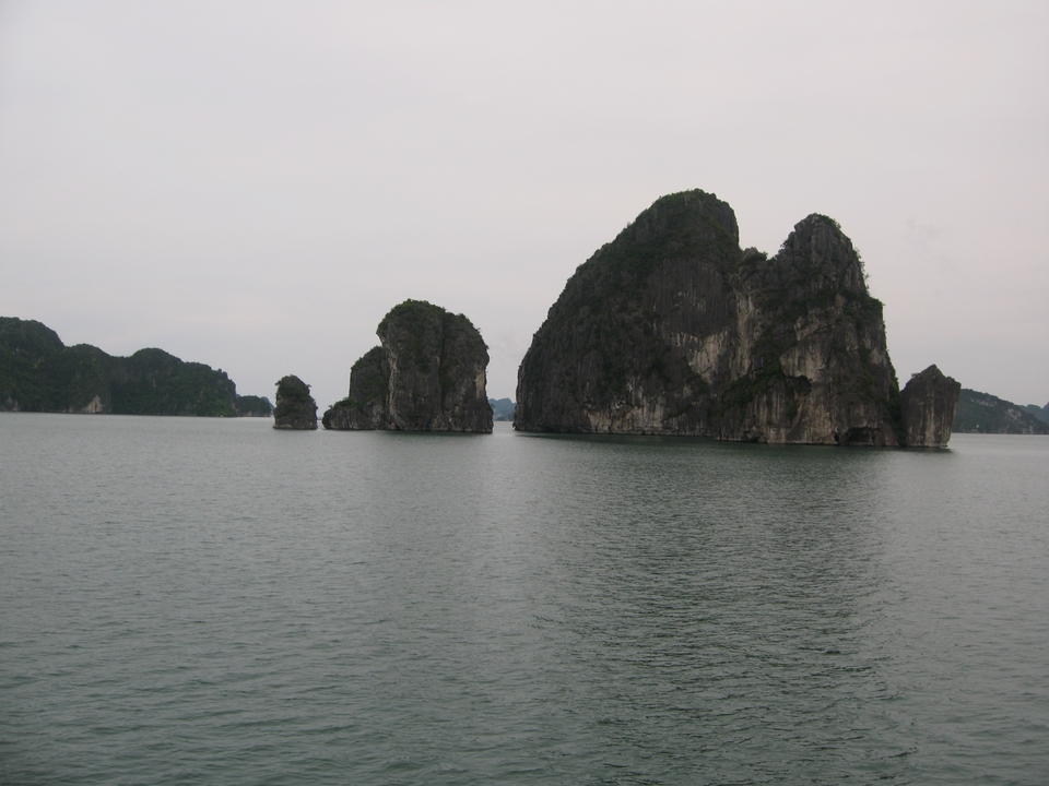 Picturesque limestone islands emerging from the sea.