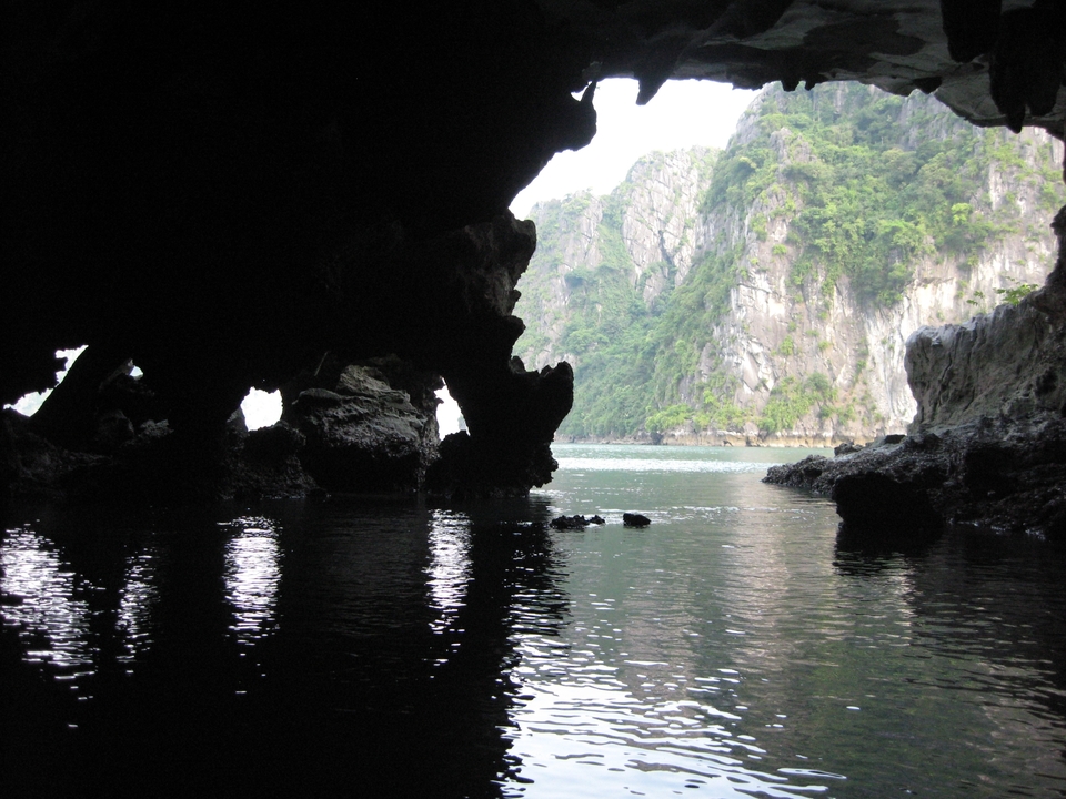 Cave opening with view of limestone landscape