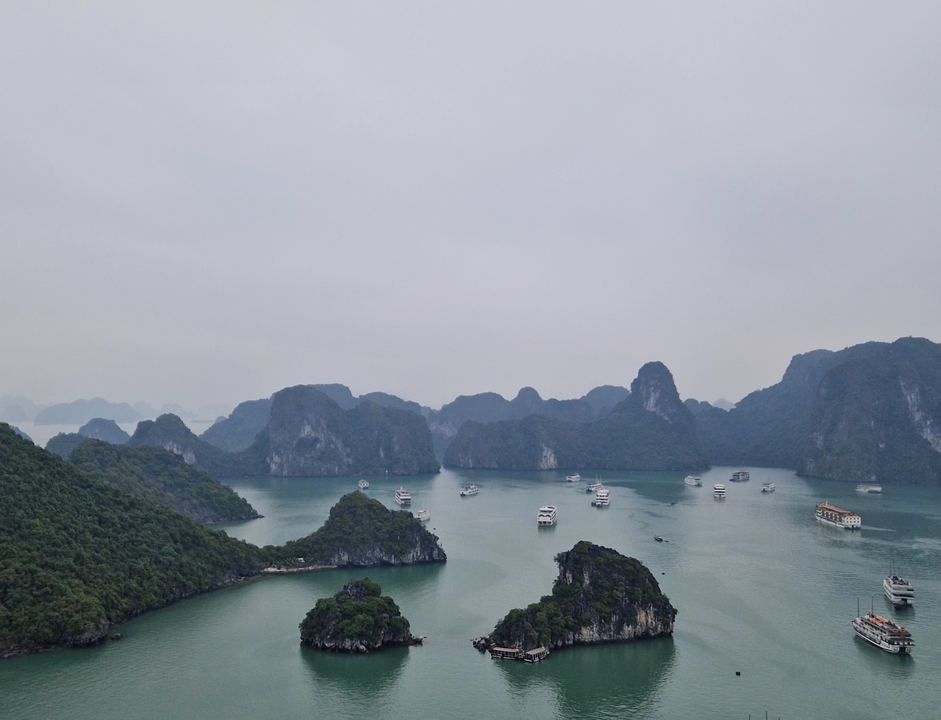 Panoramic view of Halong Bay with many boats.