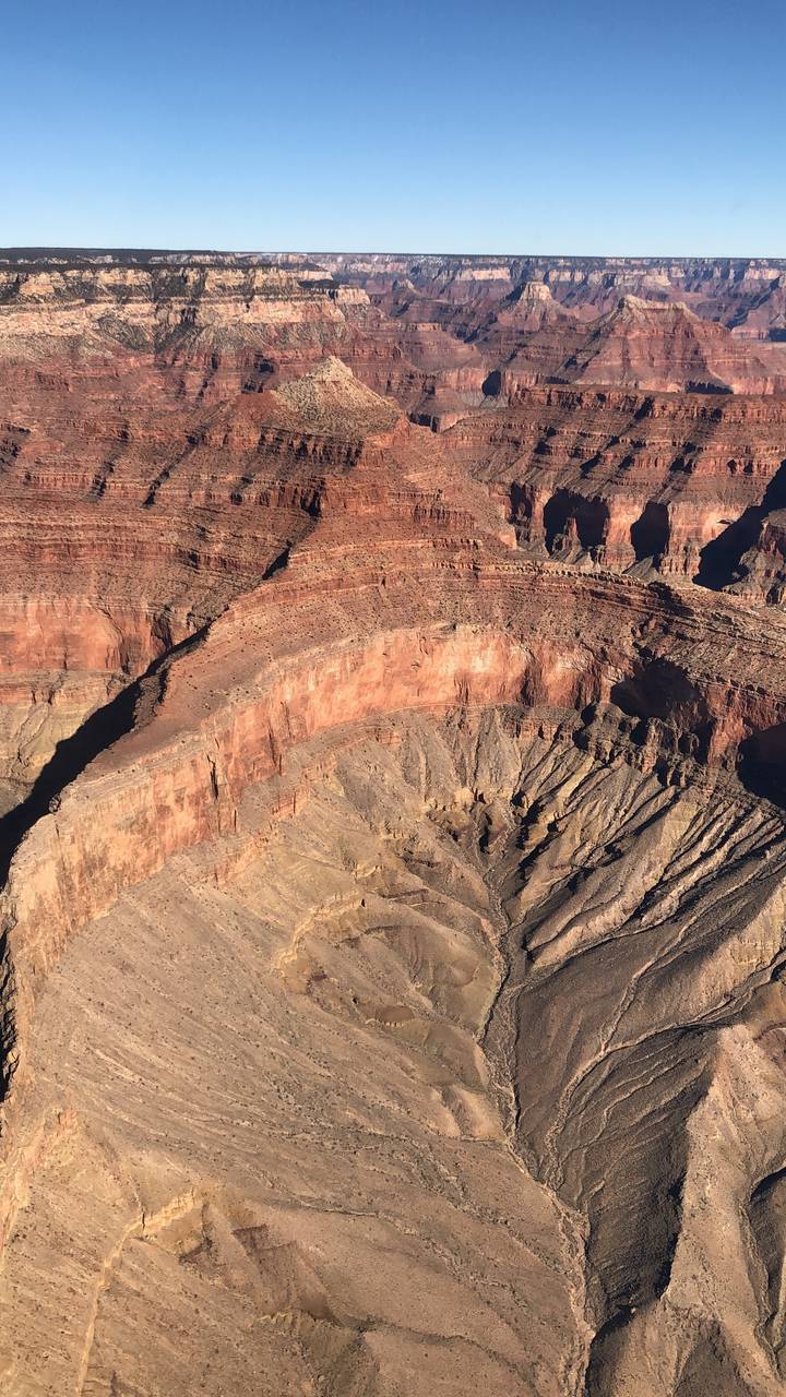 Canyon landscape with colorful rock formations.