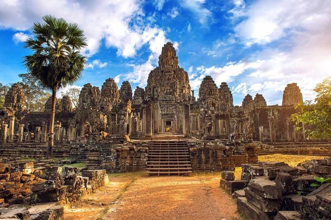 Angkor Wat temple under a vivid sky.