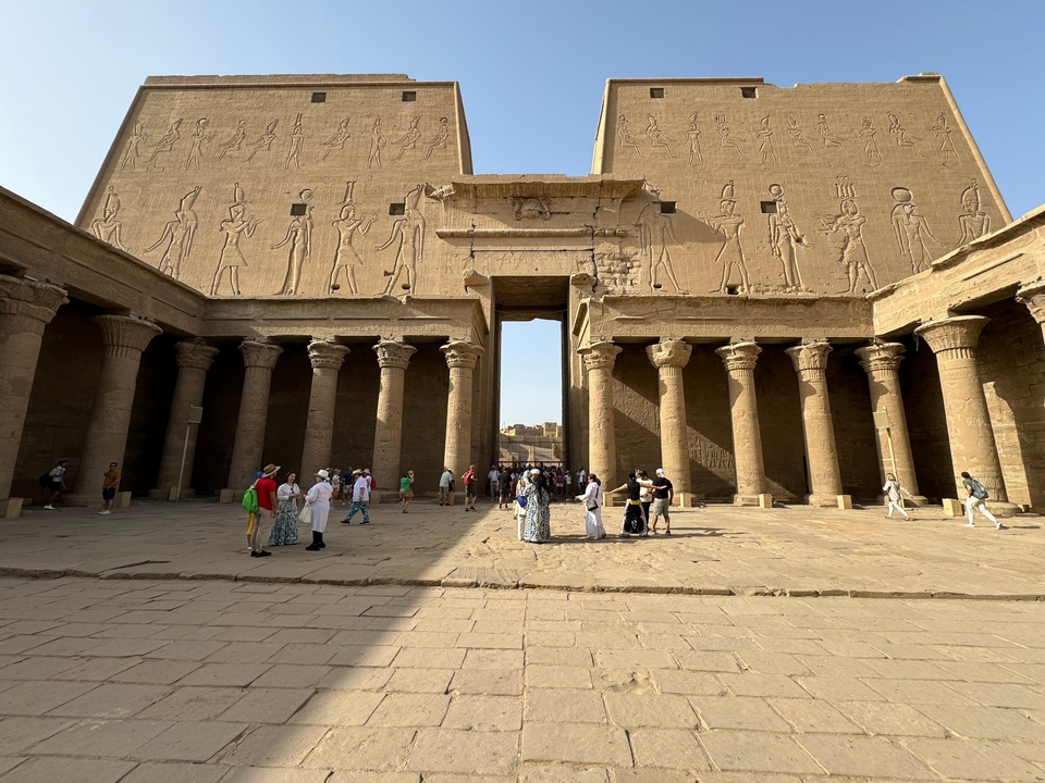 Ancient Egyptian temple with hieroglyphics and columns.