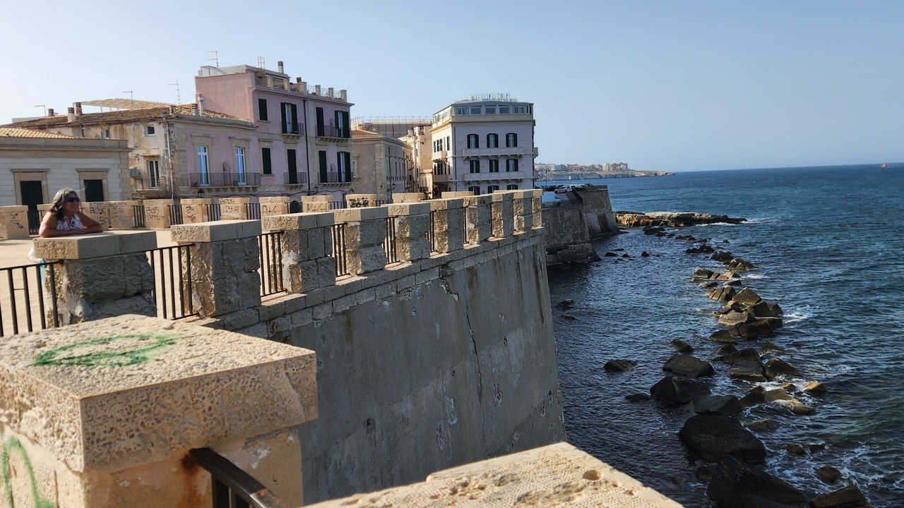 Coastal town buildings along the sea.