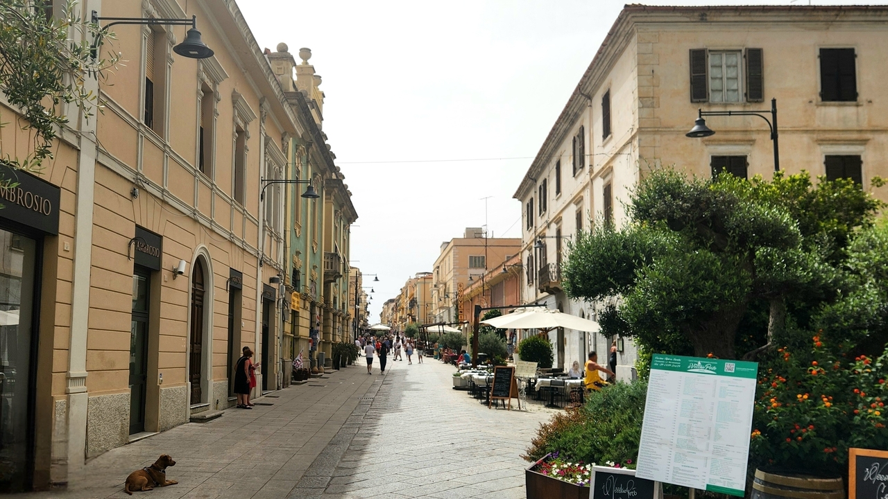 European town street with cafes and shops.