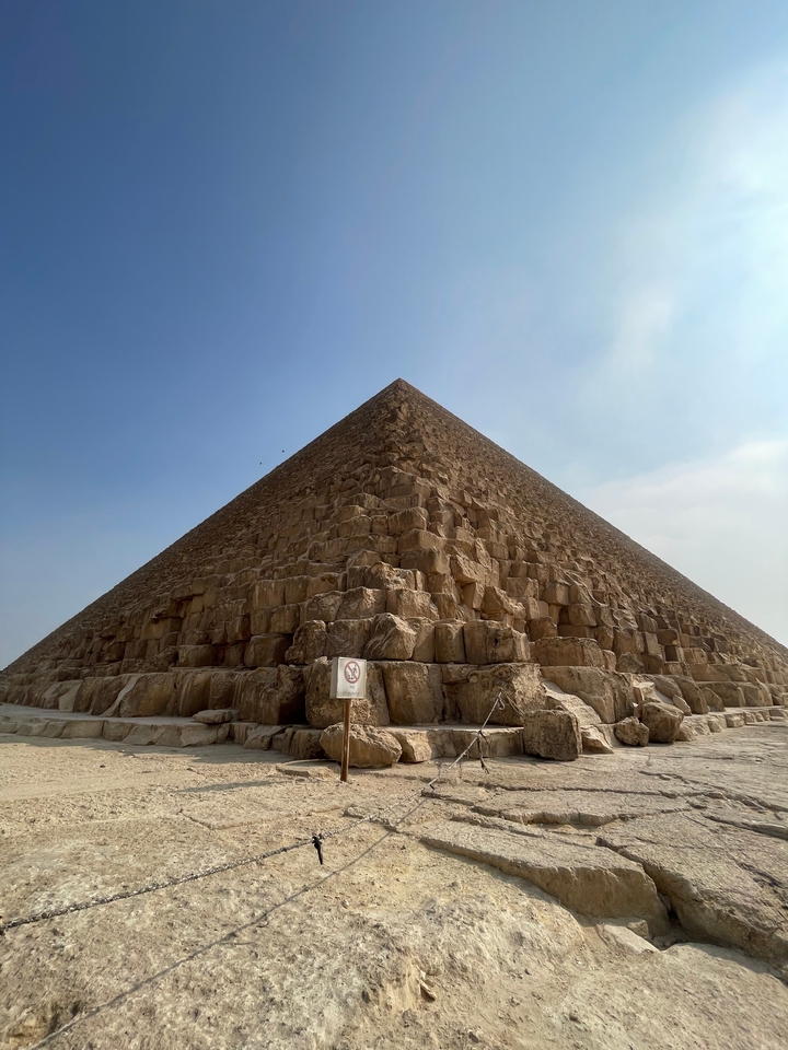 Giza pyramid with a clear blue sky.