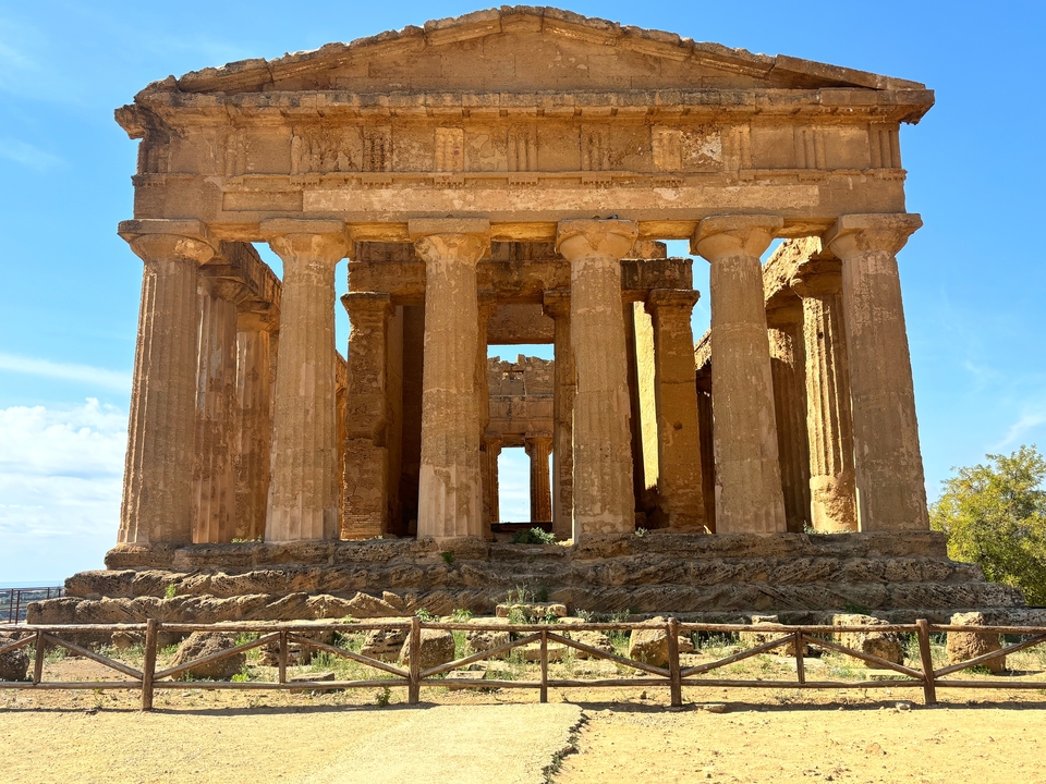 Ancient temple ruins with tall columns.
