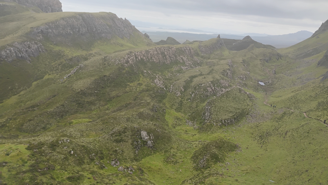 Mountainous landscape with a view of cliffs and hills.