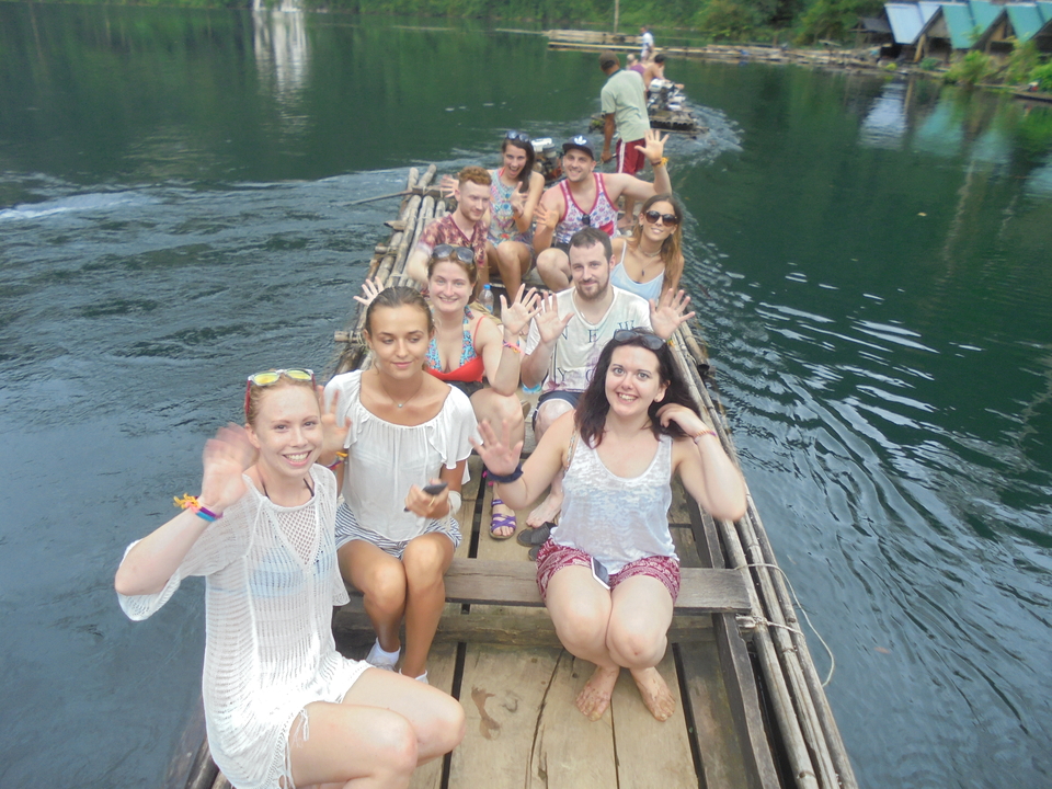 Group of people enjoying a raft ride.