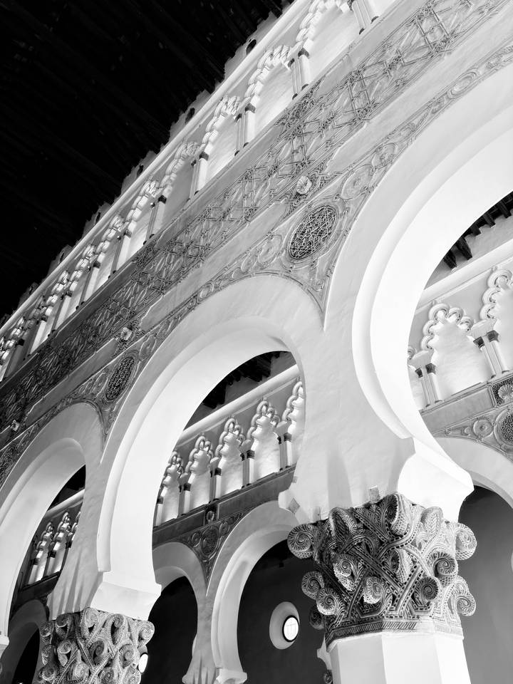 Intricate architectural design featuring arches and patterns.